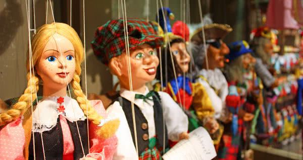 50901263 - traditional puppets made of wood. shop in prague - czech republic