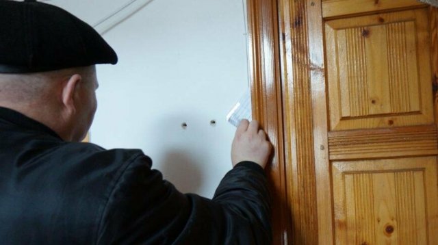 Каховські колаборанти відхрещуються від записок у дверях